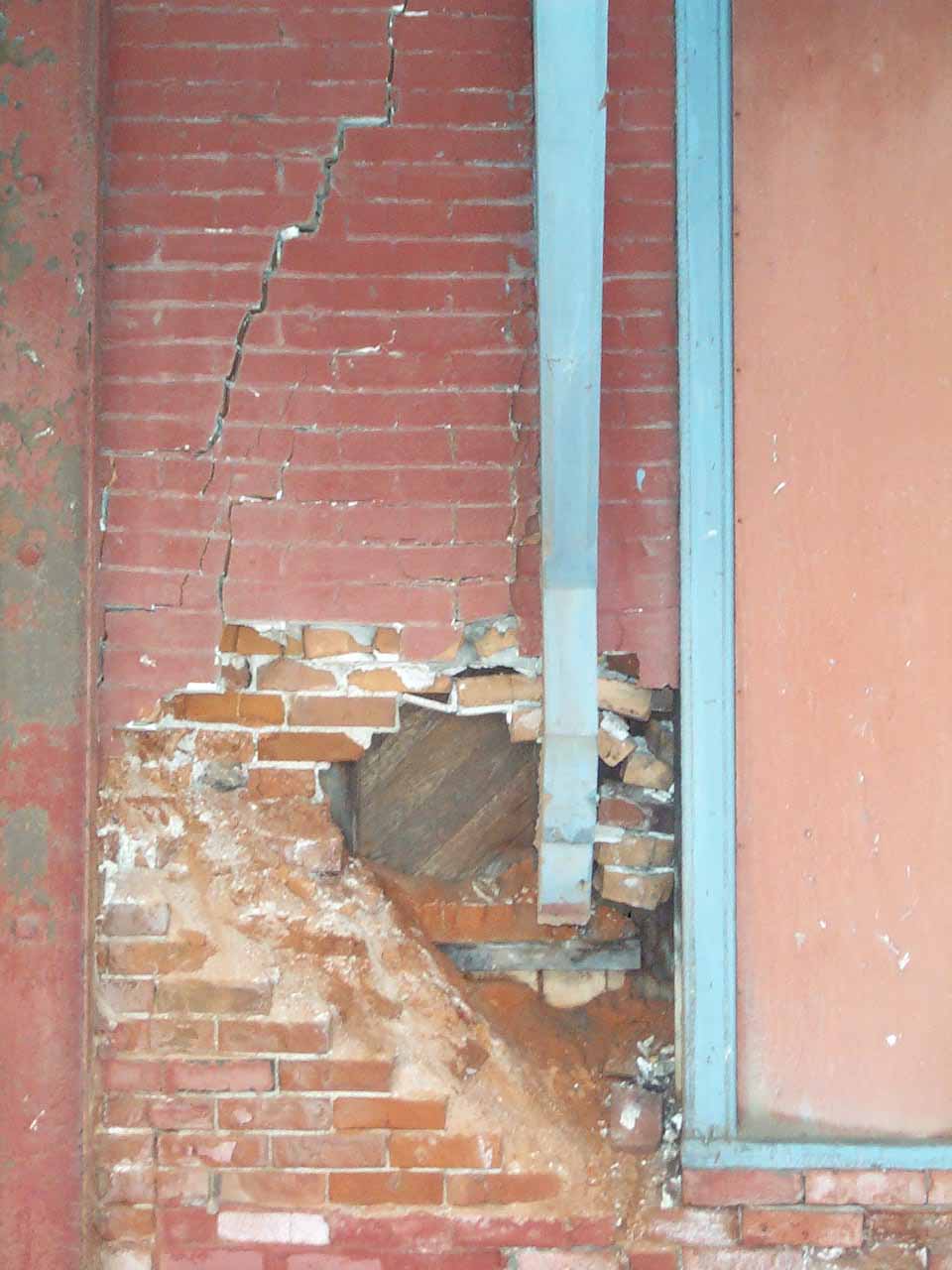 Hornell Erie Depot before restoration with boarded up windows and crumbling brick walls