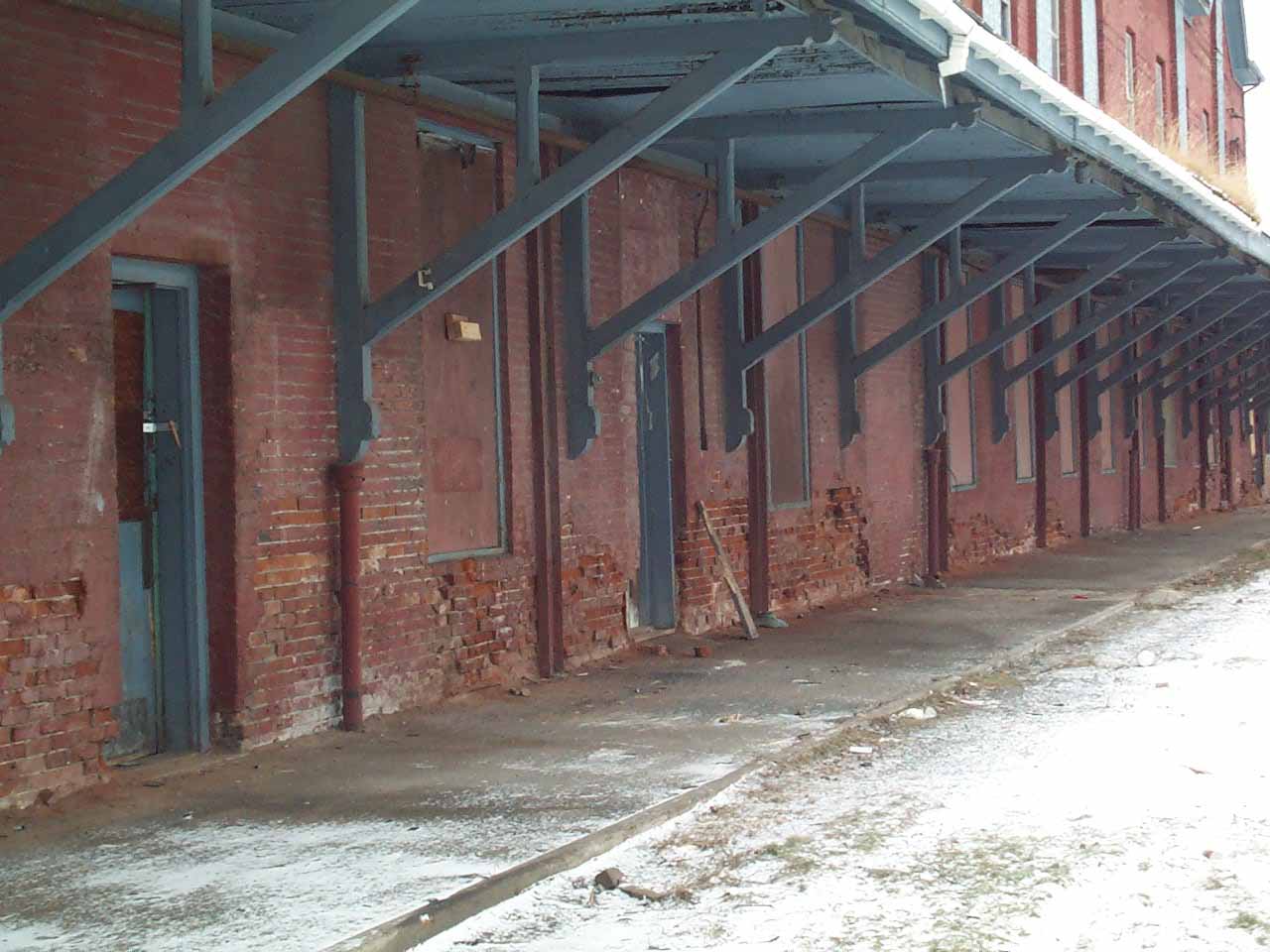 Hornell Erie Depot before restoration with boarded up windows and crumbling brick walls