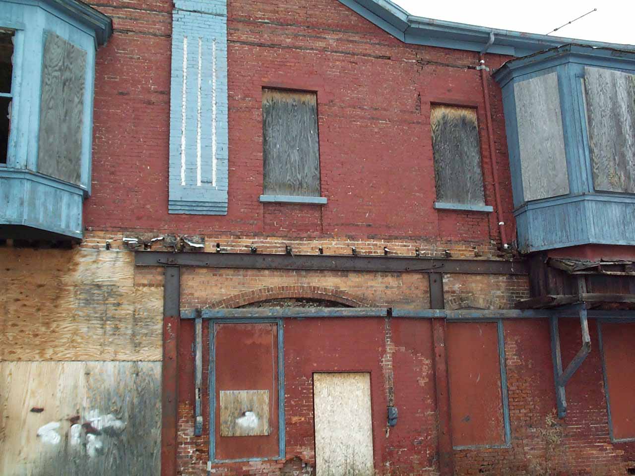 Hornell Erie Depot before restoration with boarded up windows and crumbling brick walls