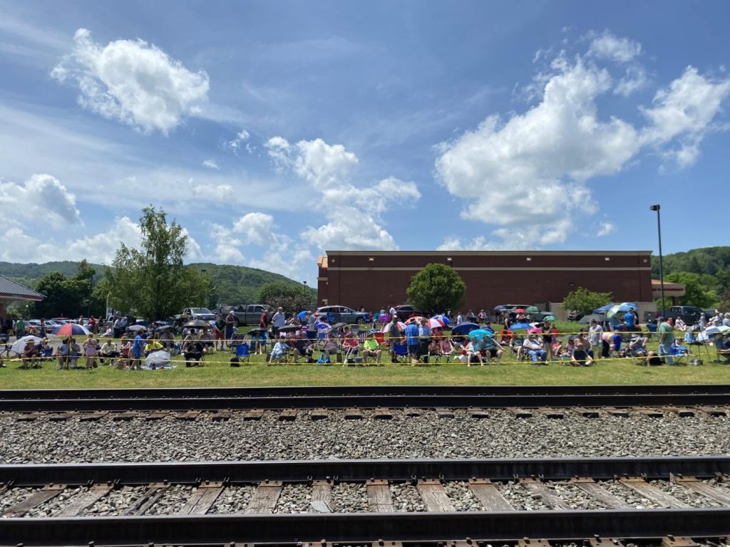 Crowd by train tracks